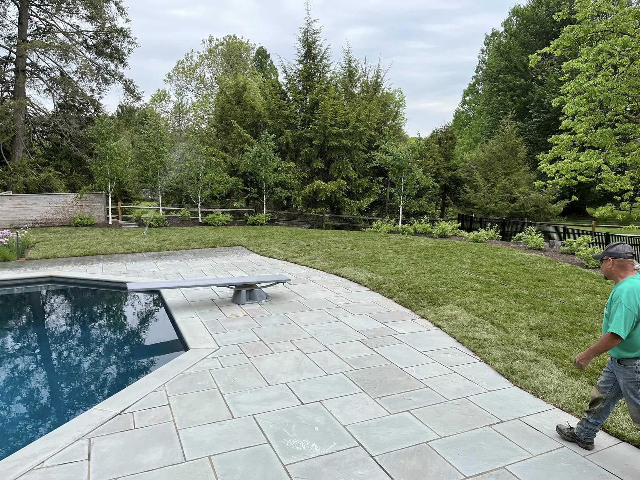 Fresh mulch and seasonal plantings in garden beds